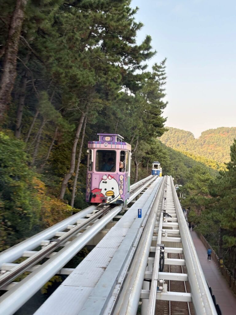 Colorful sky capsule at Haeundae Blue Line Park in Busan.