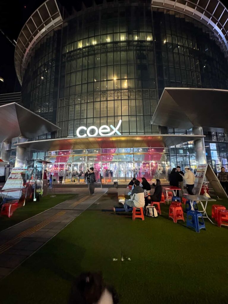 A comprehensive South Korea shopping guide featuring the modern interior of COEX Mall in Seoul